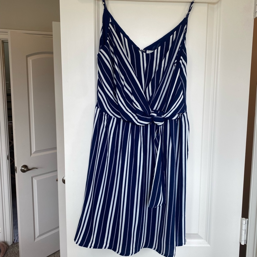 Brand new Everly stripped dress with side tie! Navy and white stripes. Size S